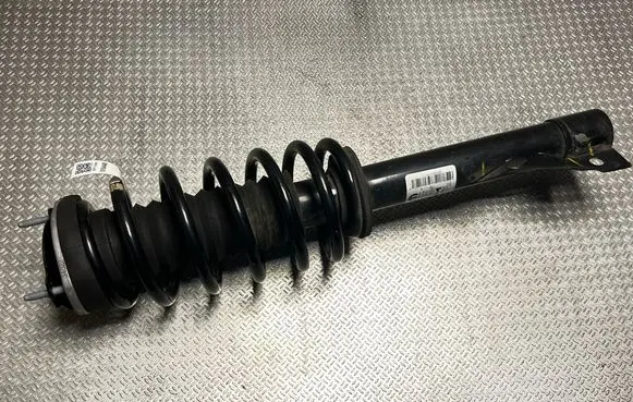 Jeep Grand Cherokee WL Front shock absorber with coil spring 68374980AE SA35000584