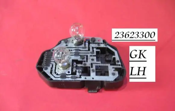 Tail light bulb cover holder