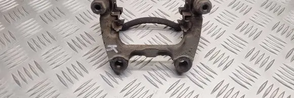 Volkswagen PASSAT B6 Brake caliper pad carrier rear 