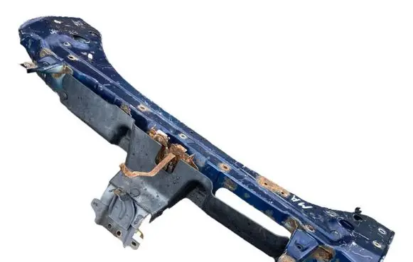 Top upper radiator support slam panel