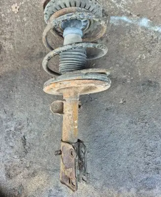 Front shock absorber with coil spring
