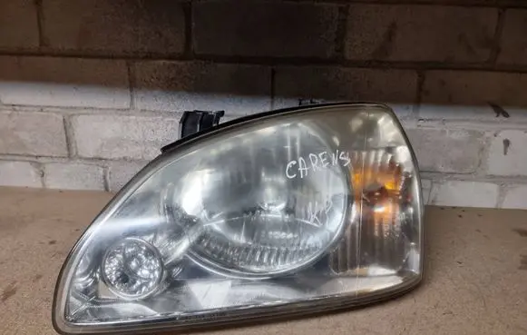 KIA Carens I Headlight/headlamp 0K2FA51020