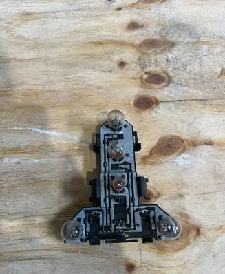 Volkswagen Golf IV Tail light bulb cover holder 1J6945257