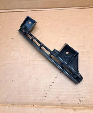 Volkswagen Touran I Front bumper mounting bracket 1T0807889B