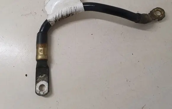 Volkswagen Touran I Negative earth cable (battery)