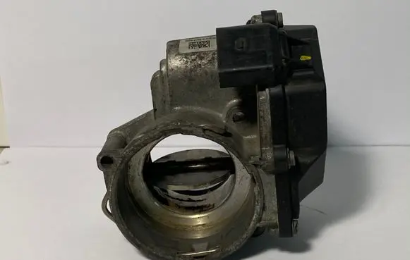 Volkswagen Touran I Throttle valve 03G128063M A2C53324665