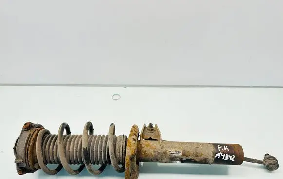 Front shock absorber with coil spring