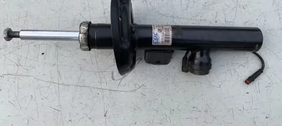 Opel Astra J Front shock absorber/damper 13382709