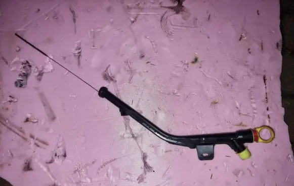 Oil level dip stick