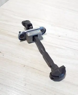 Dacia Spring Front door check strap stopper