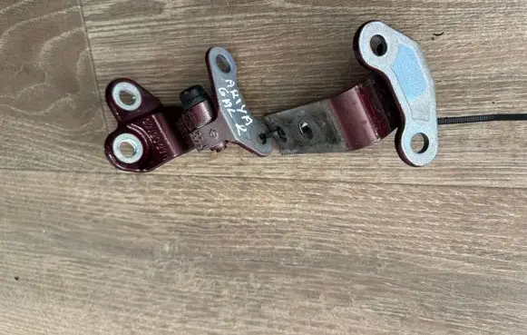 Rear door upper hinge