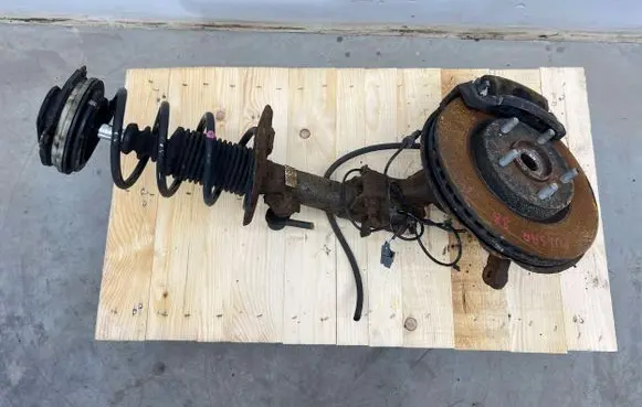 Front shock absorber with coil spring