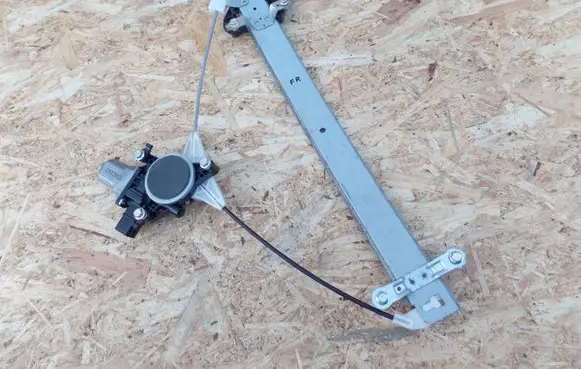 Subaru Legacy Front door window regulator with motor
