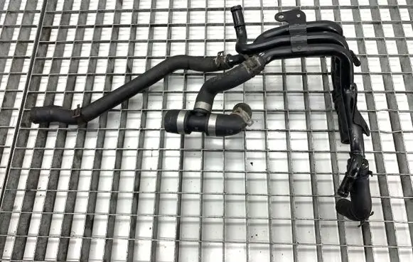 Volkswagen Golf VII Engine coolant pipe/hose 04L121064AF