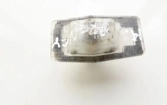 Mazda Premacy Number plate light e110384