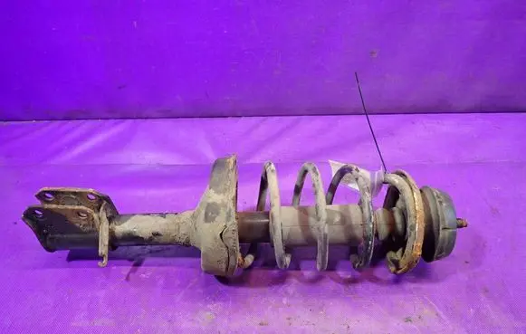Front shock absorber with coil spring