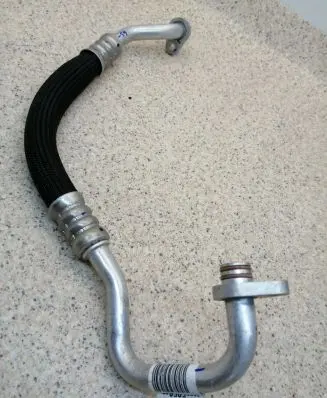 Opel Corsa F Air conditioning (A/C) pipe/hose 9829525880 T706630B
