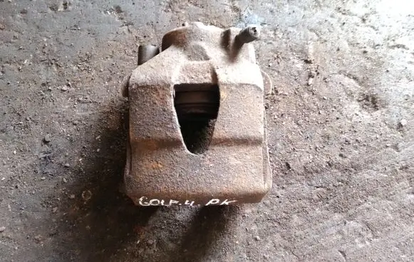 Volkswagen Golf IV Front brake caliper