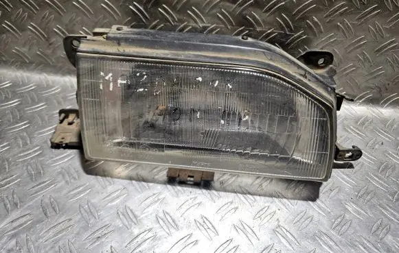 Mazda 323 Headlight/headlamp 11061247 11061249