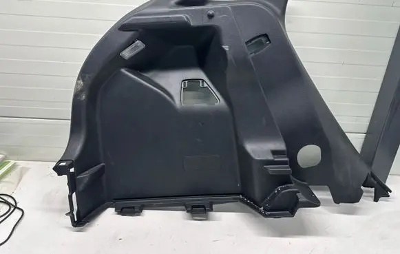Toyota Yaris XP210 Trunk/boot lower side trim panel 64740K0050