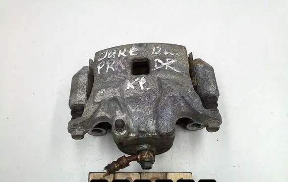 Nissan Juke I F15 Front brake caliper