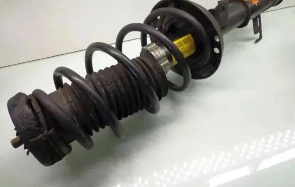 Chevrolet Cruze Front shock absorber with coil spring