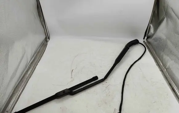 Front wiper blade arm