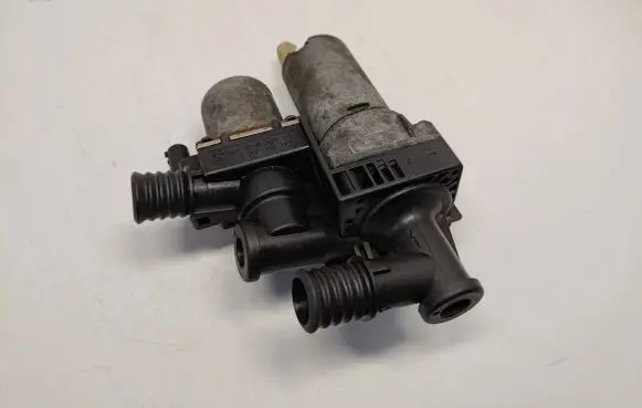Coolant heater control valve