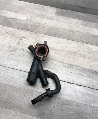Volkswagen PASSAT B7 Engine coolant pipe/hose 03L121131AA