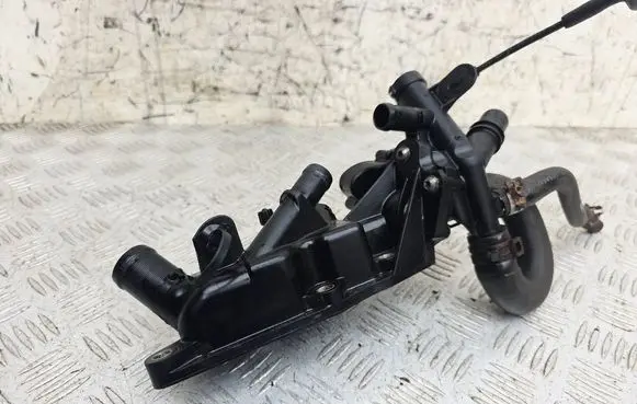 Thermostat/thermostat housing