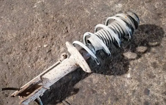 Toyota Yaris Front shock absorber with coil spring