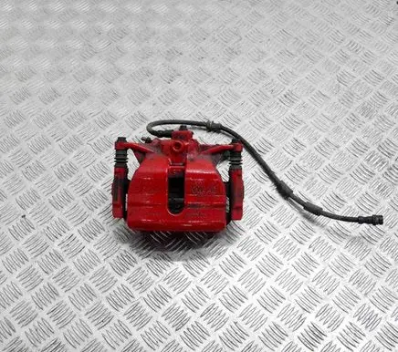 Volkswagen Golf VII Front brake caliper