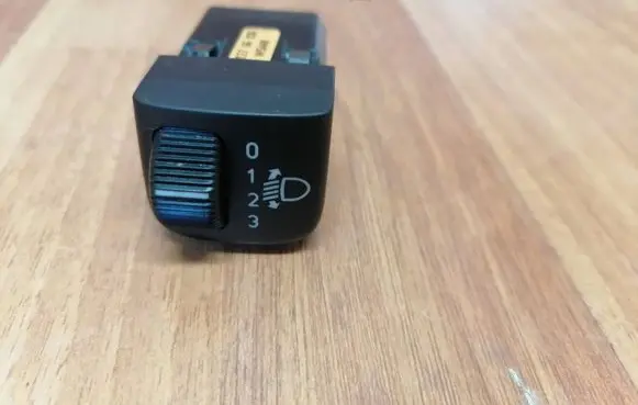 Saab 9-5 Headlight level height control switch 12766836 W544K
