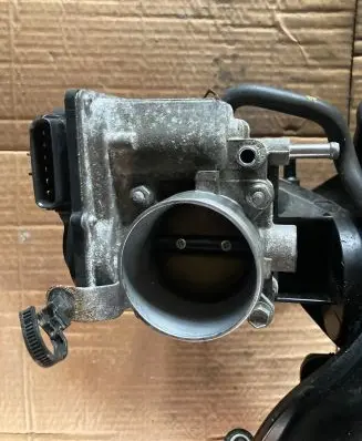 Suzuki Grand Vitara II Throttle valve 7K101280 6J00663 00179