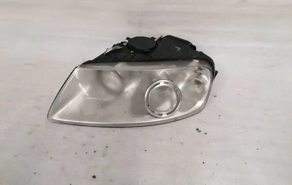 Volkswagen Touareg I Headlight/headlamp 7L6941015CF 89307851
