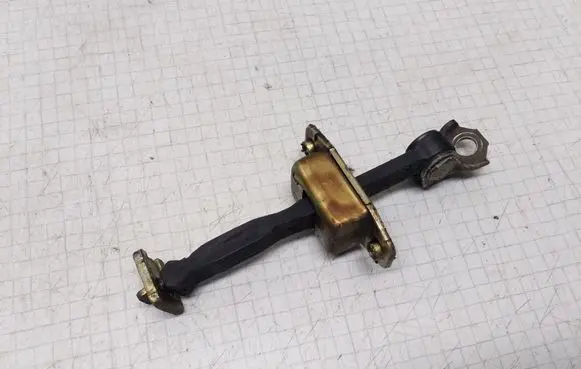 Toyota Yaris Rear door check strap stopper