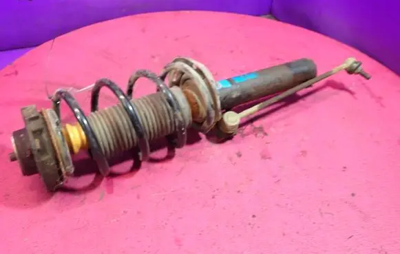 Volkswagen Golf IV Front shock absorber with coil spring 313053