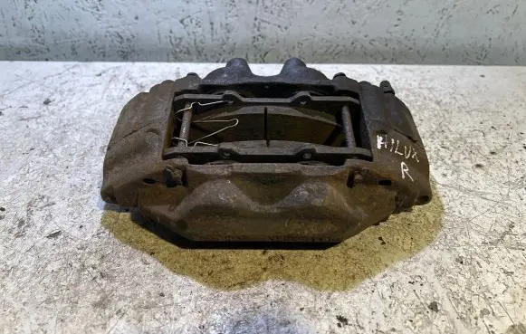 Toyota Hilux (AN10, AN20, AN30) Front brake caliper