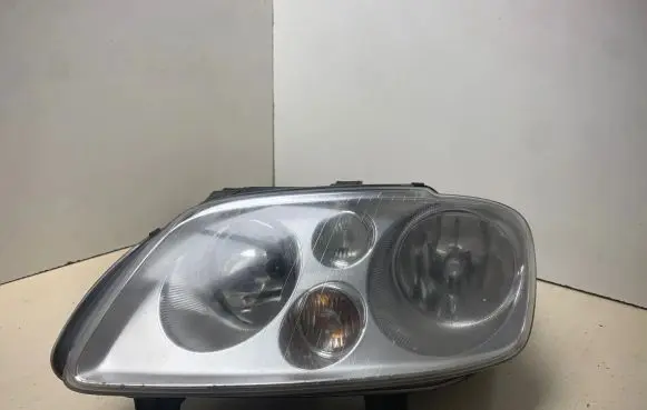 Volkswagen Touran I Headlight/headlamp 1T0941005F 0301205201