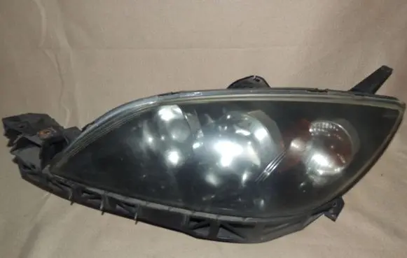 Mazda 3 I Headlight/headlamp 87AWLB