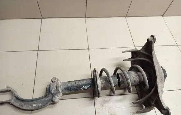 Front shock absorber with coil spring