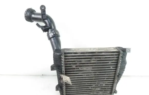 Volkswagen Touareg I Intercooler radiator 7L0145804A
