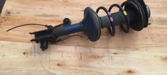 Hyundai Tucson JM Front shock absorber with coil spring 