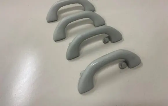 Volkswagen Tiguan A set of handles for the ceiling 1K0857607N