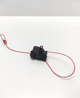 Fuel tank cap lock motor