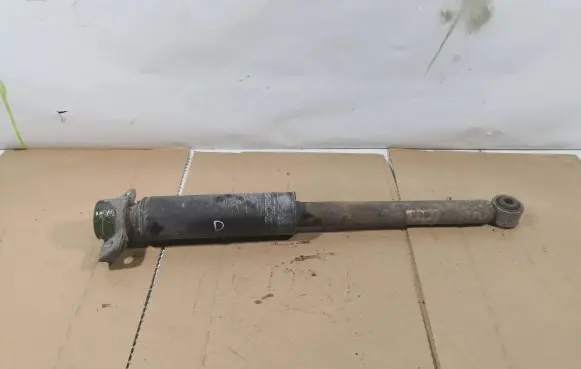 Opel Astra J Rear shock absorber/damper 13279267