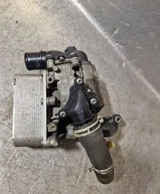 Oil filter mounting bracket
