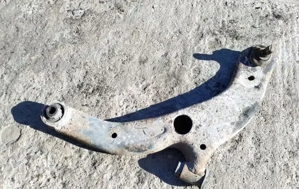 Mazda 323 Front lower control arm/wishbone