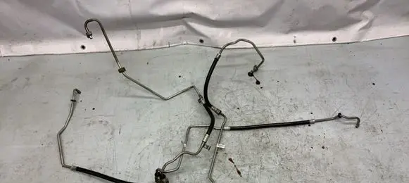Opel Astra J Gearbox oil cooler pipe/hose 16461264 16461265