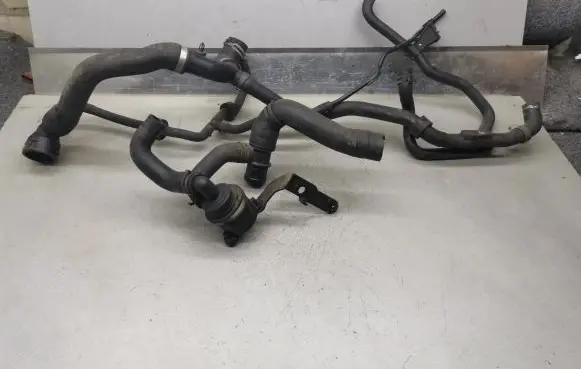 Volkswagen PASSAT CC Engine coolant pipe/hose 5N0965561A 3AA122051A 3AA122101F